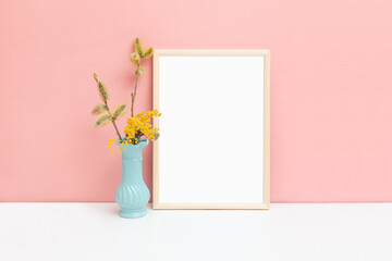 A4 size thin wood frame mockup with mimosa flowers