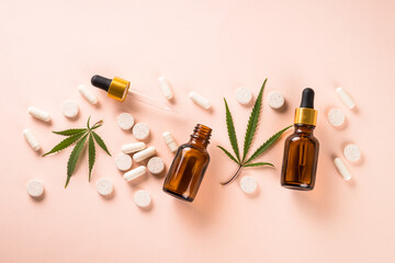CBD pills and CBD oil in glass bottle. Herbal medicine. Sedative, antibiotic, antioxidant using....