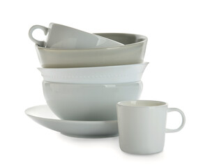 Set of stylish dinnerware on white background