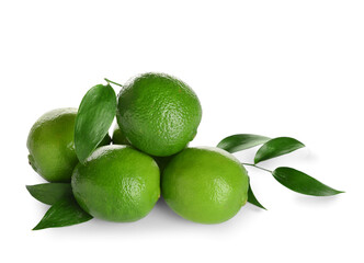 Fresh juicy limes on light background