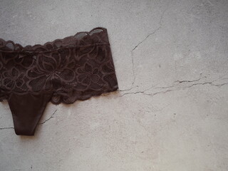 Women's panties-shorts of brown color made of guipure