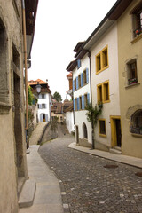 Fototapeta na wymiar pretty alley in the historical town of Estavayer-Le-Lac