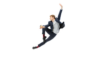 Studio shot of young male ballet dancer wearing business suit dancing isolated on white studio...