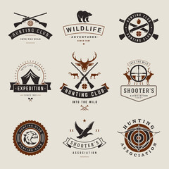 Shooting and hunting vintage clubs vector logos set. Black silhouette hunting contour trophy with crossed guns for retro club. Lucky shooter wall decoration in elegant victorian style.