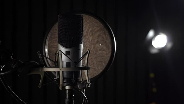  professhional studio microphone on a dark background