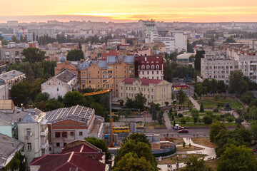 Ukraine, Kyiv – July 04, 2015: Aerial panoramic view on central and historical part, area of city Podil with residential buildings in the evening, during the sunset. Pre-revolutionary buildings