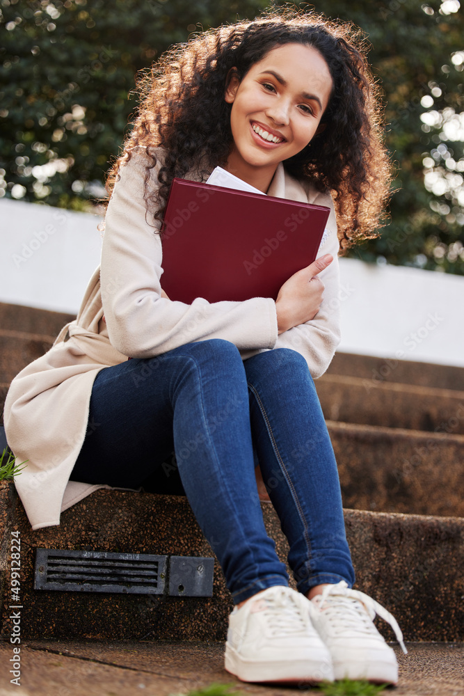 Canvas Prints Ready for my next class. Portrait of an attractive young female university student sitting outside on campus during her break.