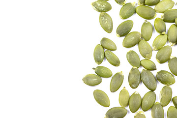 Pumpkin seeds macro view isolated on a white background. Healthy raw food