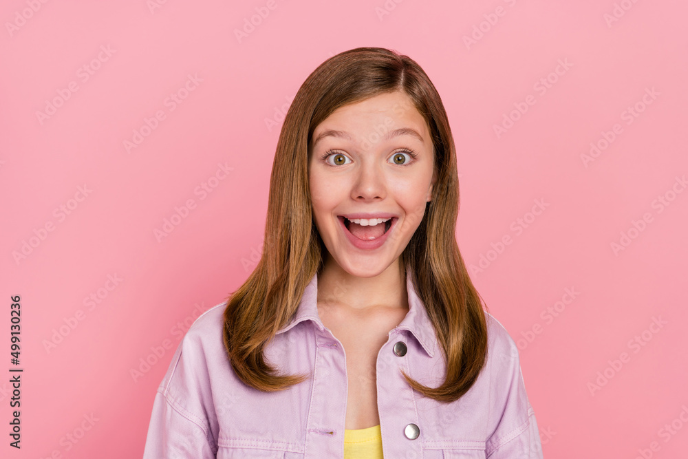 Wall mural Photo of youth excited teenage girl face reaction discount information isolated over pink color background