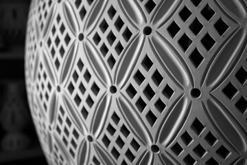 Tunisian pottery. Close detail and shallow focus on a decorative vase in a traditional arabic North African pattern.