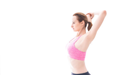 Fototapeta premium ストレッチをする笑顔の若い女性