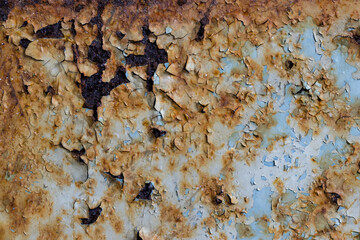 Texture of rusty metal with peeling paint. Rough metal surface with rust. Corroded and oxidized old...