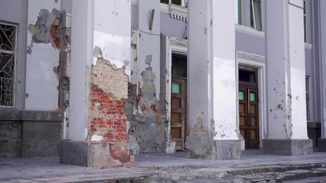4k video of damaged ruined house of post office in ukrainian city Chernihiv near Kyiv on north of Ukraine. Ruins during War of Russia against Ukraine. Walls of ruined building by enemy artillery