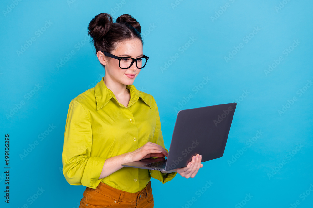 Poster photo of smart manager lady hold use wireless netbook write message isolated on blue color backgroun