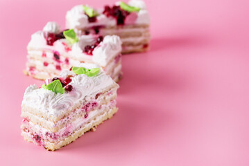 Piece of Biscuite Cake with Cream Tasty Dessert Pink Background