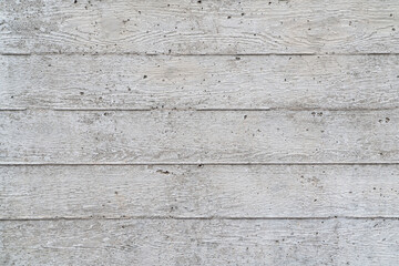 Fototapeta na wymiar texture of new gray grunge concrete wall with embedded grain and pattern of wooden planks for background