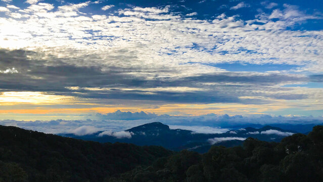 The first light of the day on the top of the mountain At the Kew Mae Pan Nature Trail, Thailand