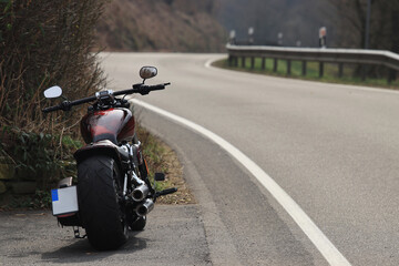Motorbike standing by the road