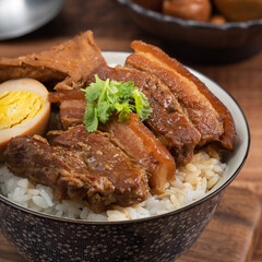 Braised pork belly over cooked rice, famous and delicious street food in Taiwan.