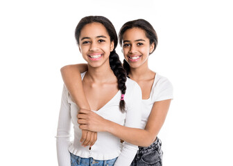 Fototapeta premium Adorable black twin teen girl on studio white background