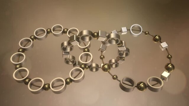 Animazione 3D con anelli con sfere e cubetti legati da un filo con colore oro ed argento