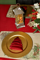 View of Christmas table place setting.