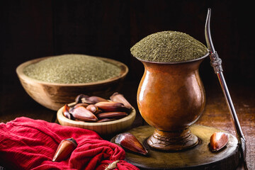 Chimarrão, or mate, is a drink produced by infusing the yerba mate plant in boiling water, served...