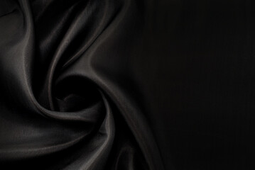 Part of the dark fabric texture of the fabric for the background and decoration of the work of art,...