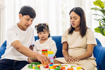 Portrait of enjoy happy love asian family father and mother with little asian girl smiling activity...