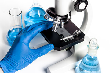 Research in medical laboratory with microscope equipment, close up