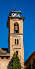 Fototapeta na wymiar Decorated church tower in Granada, Spain 