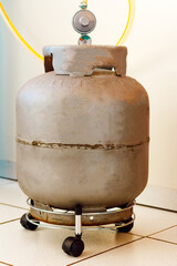 In this photo illustration the cylinder of liquefied petroleum gas (LPG), composed of propane and...
