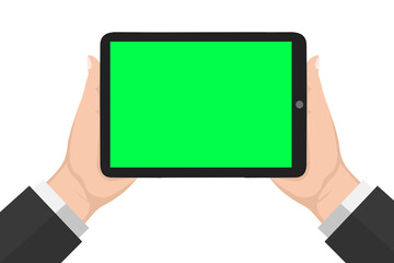 Isolierte menschliche Hände, die schwarze Tablette mit green screen halten