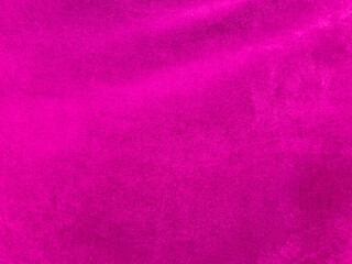 Pink velvet fabric texture used as background. Empty pink fabric background of soft and smooth...