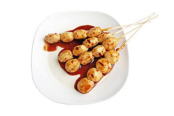 Meatballs with sweet & spicy sauce on a white background