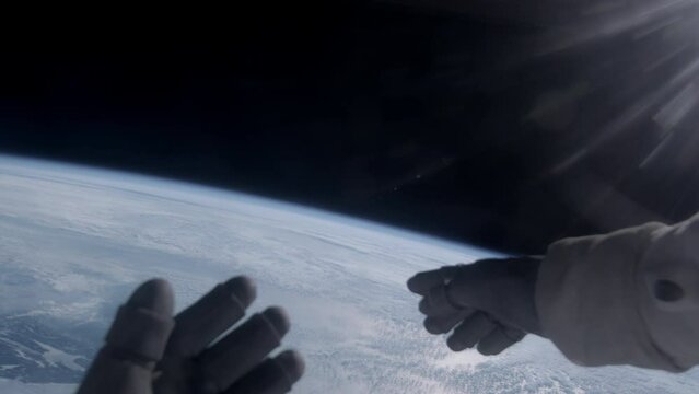 POV First person view of Earth through the astronaut helmet during the spacewalk