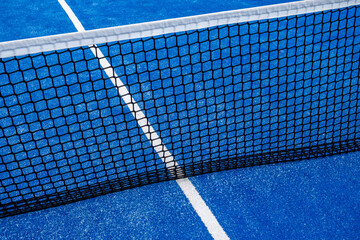 blue paddle tennis court, net view