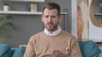 Portrait of Man Getting Angry on Video Call 