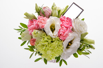 Festive floral arrangement on a white isolated background. Top view