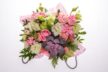 Festive floral arrangement on a white isolated background. Top view