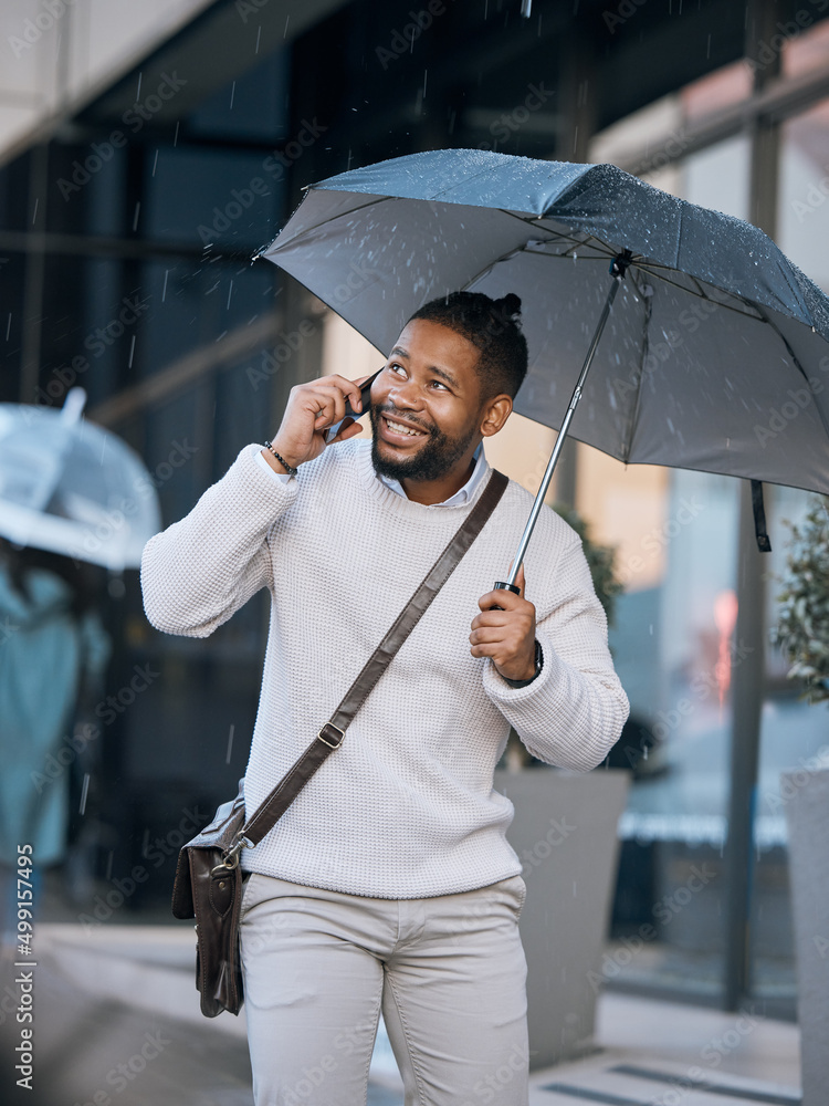 Aufkleber yeah it just started raining. cropped shot of a handsome young businessman making a phonecall while 