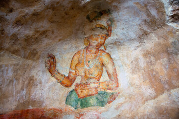 Fototapeta na wymiar Ancient paintings frescoes in sigiriya rock fortress Dambulla, Sri Lanka