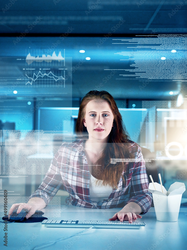 Poster She is a human computer. Portrait of a focused young female programmer working on a computer in the office at work during the night.