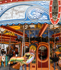 Classic and vintage merry-go-round carousel amusement park ride