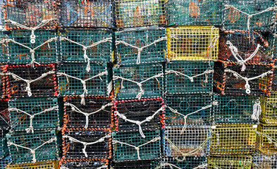 Empty lobster and crab trapping cages on the commercial fishing pier