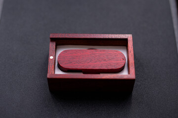 red wooden box with flash drive