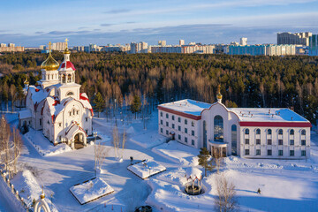 Obraz premium Surgut city in winter. Church of St. George the Great Martyr. Aerial view.