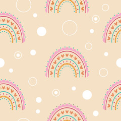 seamless background with cute decorative patterns in the form of rainbows and circles. gentle children's theme on the pattern
