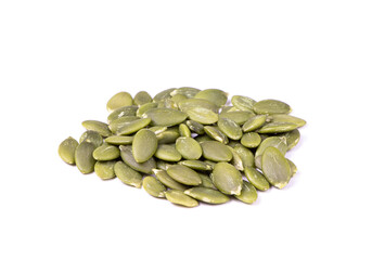 Pumpkin seeds macro view isolated on a white background. Healthy raw food