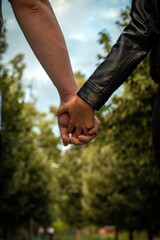 couple holding hands together